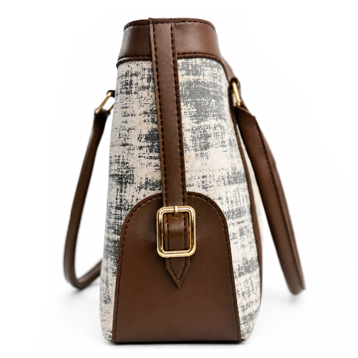 Small handbag with brown leather accents and a gold buckle on a white background
