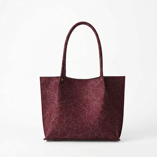 Tote mockup in burgundy patterned fabric