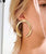 Hollow semicircle earrings.